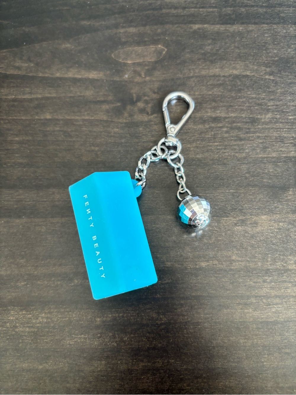 NWOT Fenty Beauty Turquoise Lip Gloss Charm with Silver Disco Ball
